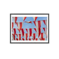 Framed artwork with geometric pattern of red, white, and blue triangles on a white background