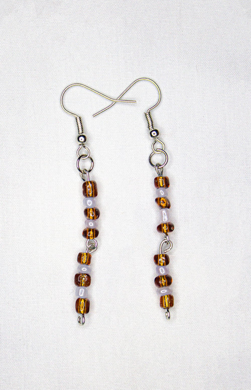 brown and white earrings