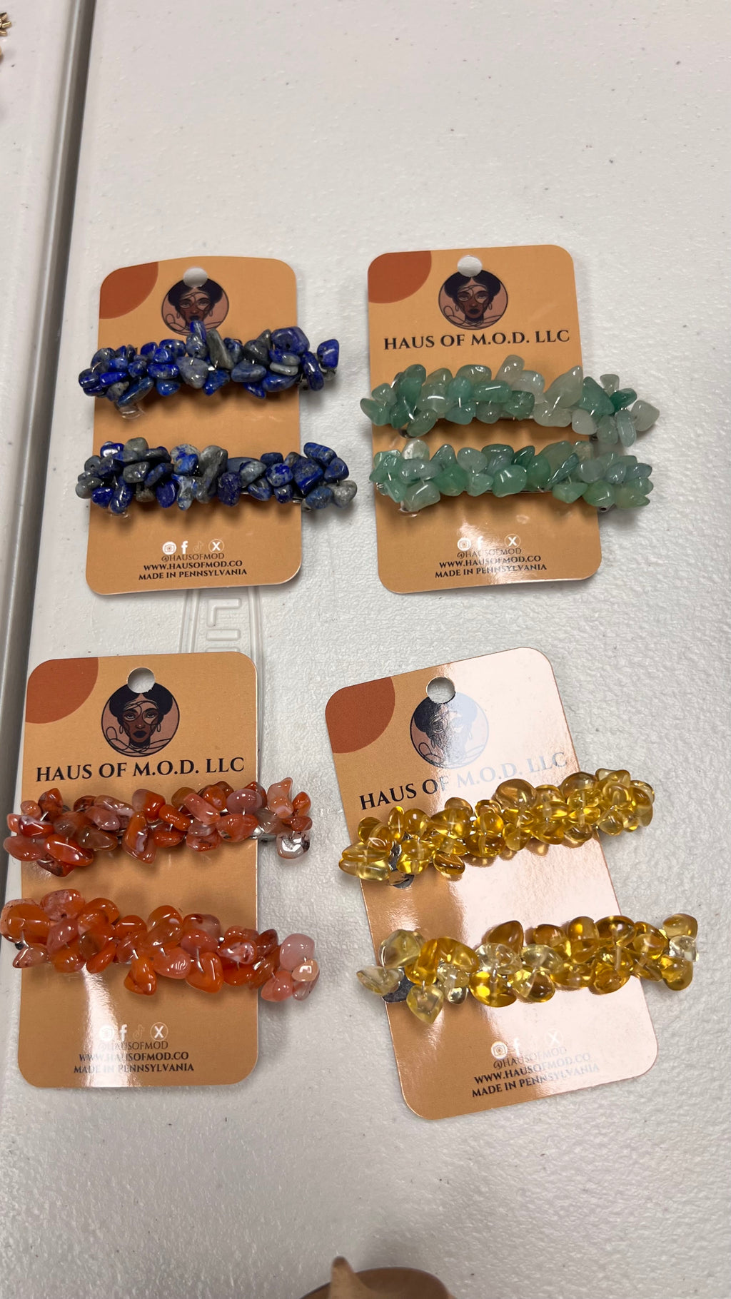 Crystal wrapped french barrettes packaged:  Lapis Lazuli, Red Jasper, Green Aventurine, Yellow Jade